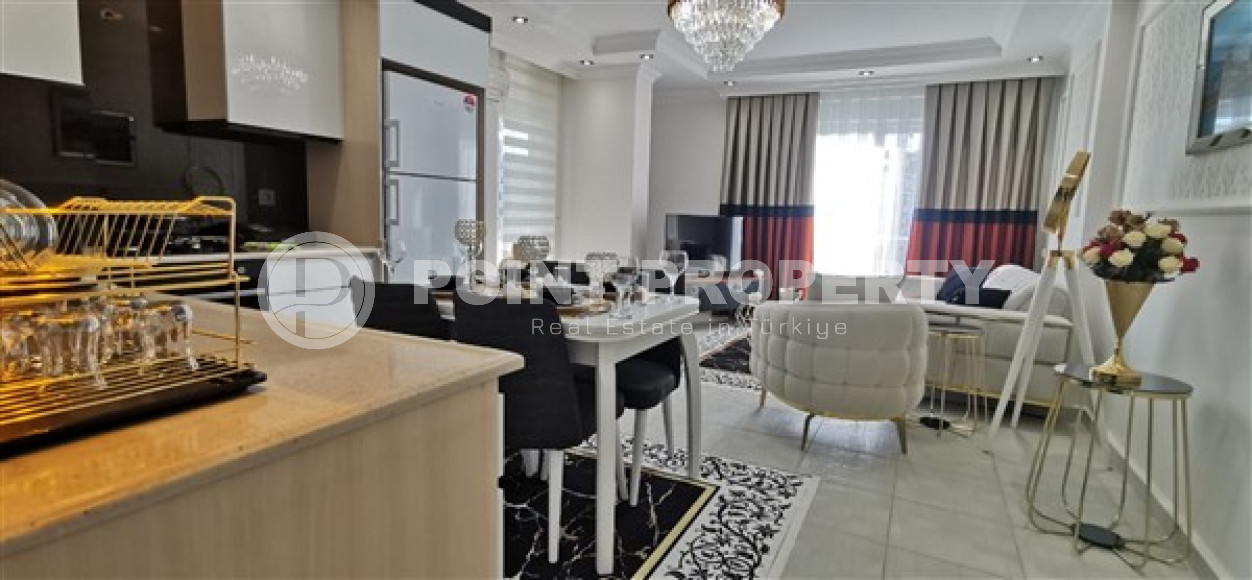 Elegant two bedroom apartment, 120m², in a complex with a swimming pool in Mahmutlar, 750m from the sea-id-2577-photo-2