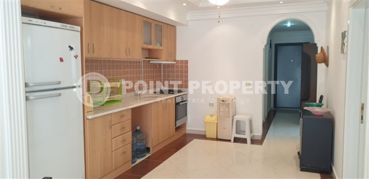 Двухкомнатная квартира в районе Конаклы, в 250 метрах от моря, площадью 110 м2 укомплектованная мебелью-id-2595-фото-7