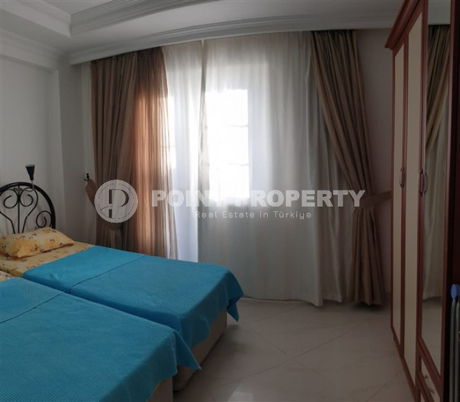 Двухкомнатная квартира в районе Конаклы, в 250 метрах от моря, площадью 110 м2 укомплектованная мебелью-id-2595-фото-9