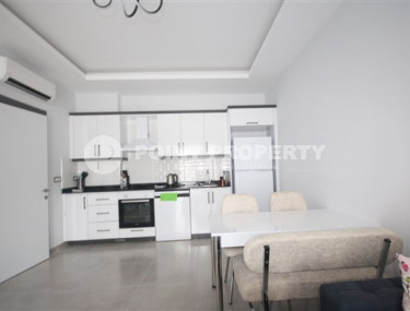 Inexpensive 1+1 apartment in a new building in the Mahmutlar area, Alanya, built in 2021, within walking distance from the city center-id-2597-photo-4