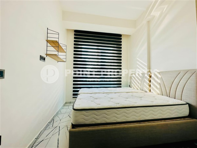 One-bedroom apartment with furniture in a new complex with infrastructure, 50 m², in the Upper Oba area, Alanya-id-2598-photo-7