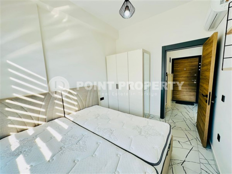 One-bedroom apartment with furniture in a new complex with infrastructure, 50 m², in the Upper Oba area, Alanya-id-2598-photo-8