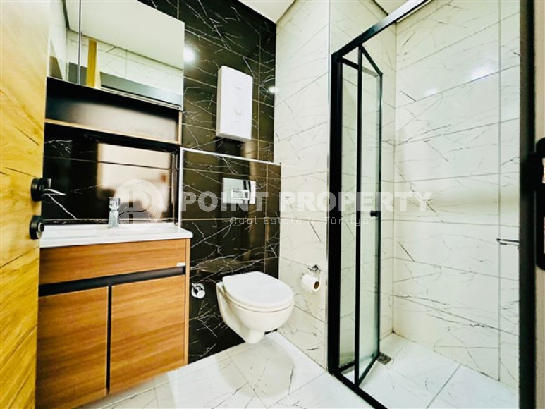 One-bedroom apartment with furniture in a new complex with infrastructure, 50 m², in the Upper Oba area, Alanya-id-2598-photo-9