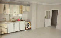 Two bedroom apartment, 85m², in a residence with a swimming pool, by the sea, in the center of Mahmutlar-id-2611-photo-3