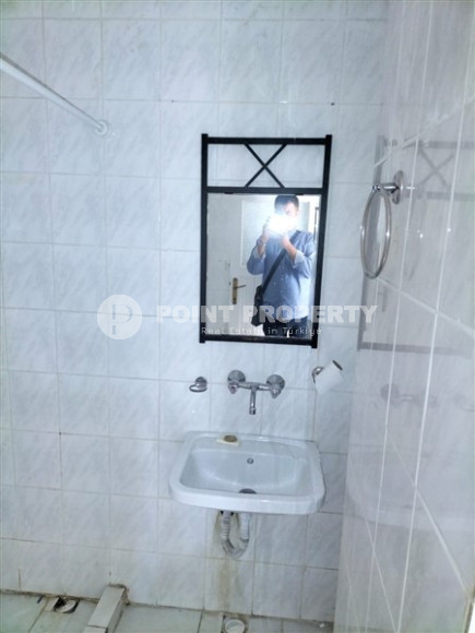 Two bedroom apartment, 85m², in a residence with a swimming pool, by the sea, in the center of Mahmutlar-id-2611-photo-7