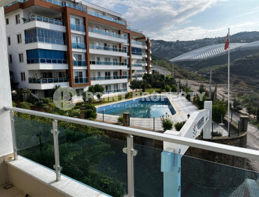 Уютная квартира с двумя спальнями, 112м², в грандиозной элитной резиденции района Каргыджак, Алания.-id-2616-фото-1