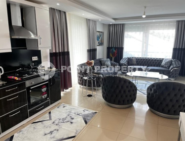 Уютная квартира с двумя спальнями, 112м², в грандиозной элитной резиденции района Каргыджак, Алания.-id-2616-фото-5