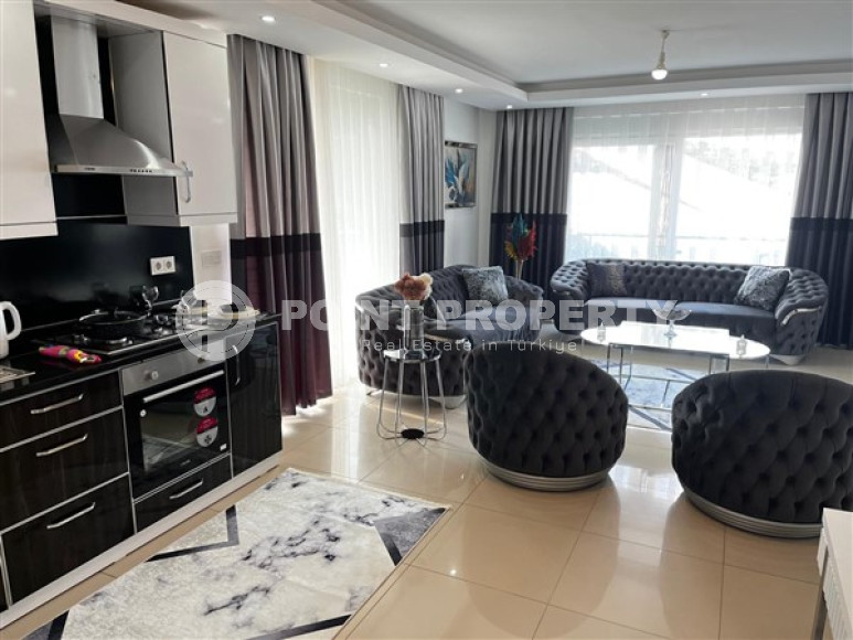 Уютная квартира с двумя спальнями, 112м², в грандиозной элитной резиденции района Каргыджак, Алания.-id-2616-фото-5