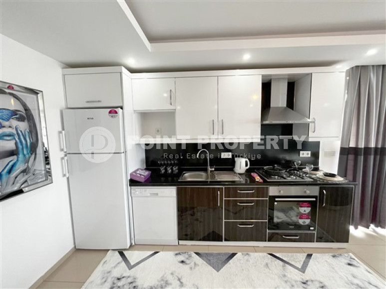 Уютная квартира с двумя спальнями, 112м², в грандиозной элитной резиденции района Каргыджак, Алания.-id-2616-фото-9