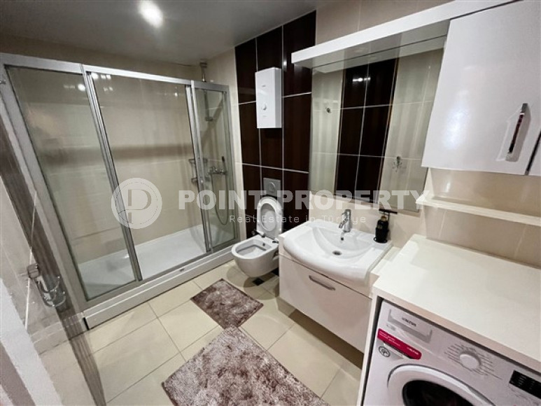 Уютная квартира с двумя спальнями, 112м², в грандиозной элитной резиденции района Каргыджак, Алания.-id-2616-фото-11