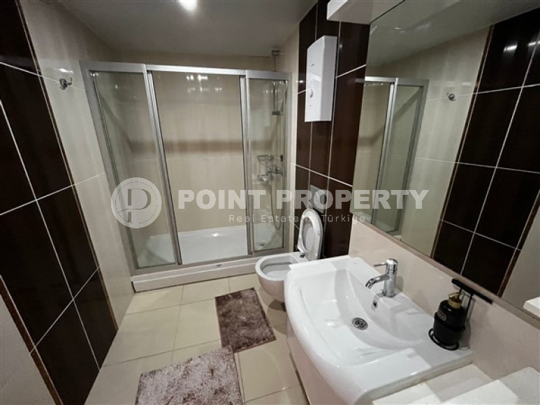 Уютная квартира с двумя спальнями, 112м², в грандиозной элитной резиденции района Каргыджак, Алания.-id-2616-фото-12