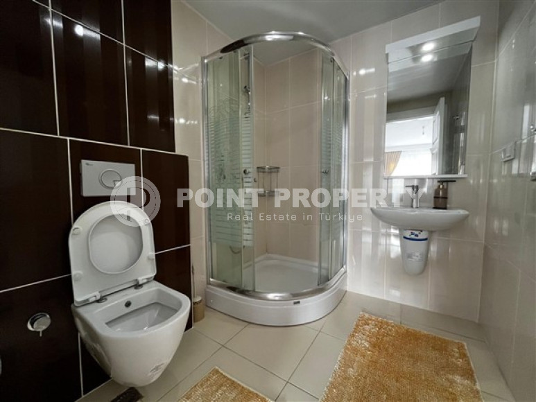 Уютная квартира с двумя спальнями, 112м², в грандиозной элитной резиденции района Каргыджак, Алания.-id-2616-фото-14