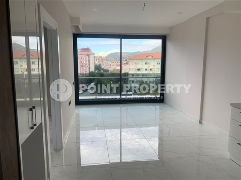 New stylish 1+1 apartment, in a new premium class building in 2022, in the central area of Alanya, 55m2-id-2617-photo-4