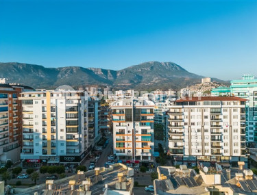 Furnished one-bedroom apartment, 70m², on the main street of Mahmutlar, Alanya-id-2624-photo-1