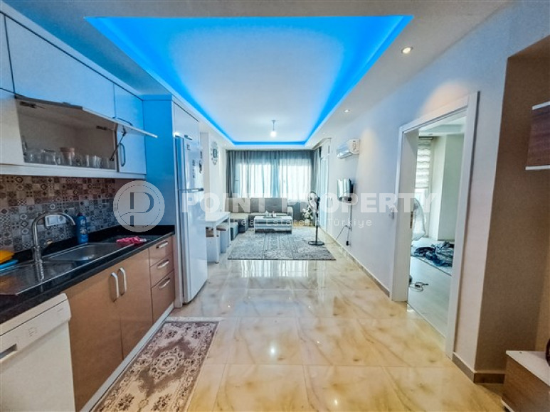 Furnished one-bedroom apartment, 70m², on the main street of Mahmutlar, Alanya-id-2624-photo-5