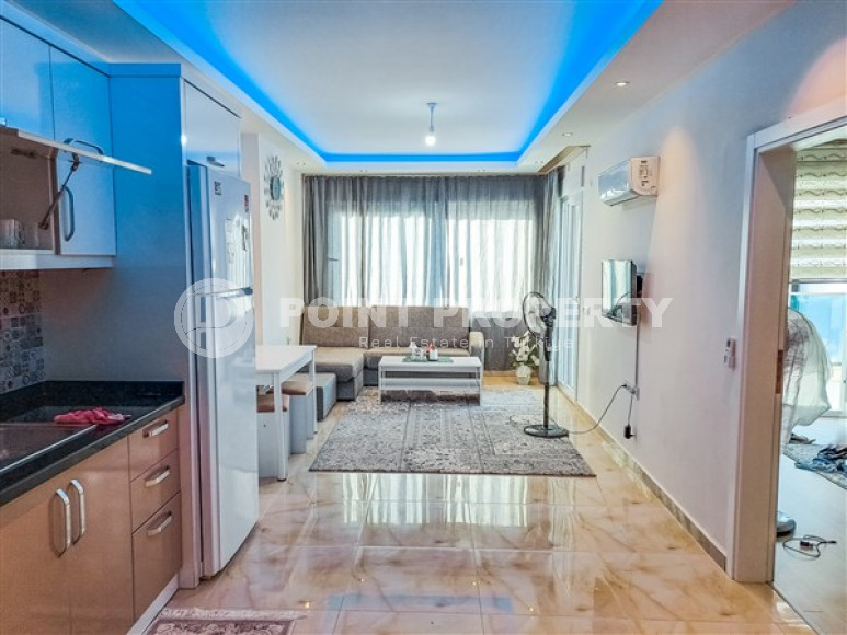 Furnished one-bedroom apartment, 70m², on the main street of Mahmutlar, Alanya-id-2624-photo-6