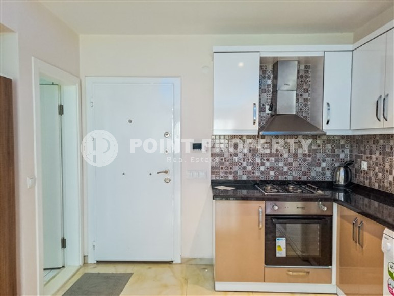 Furnished one-bedroom apartment, 70m², on the main street of Mahmutlar, Alanya-id-2624-photo-9