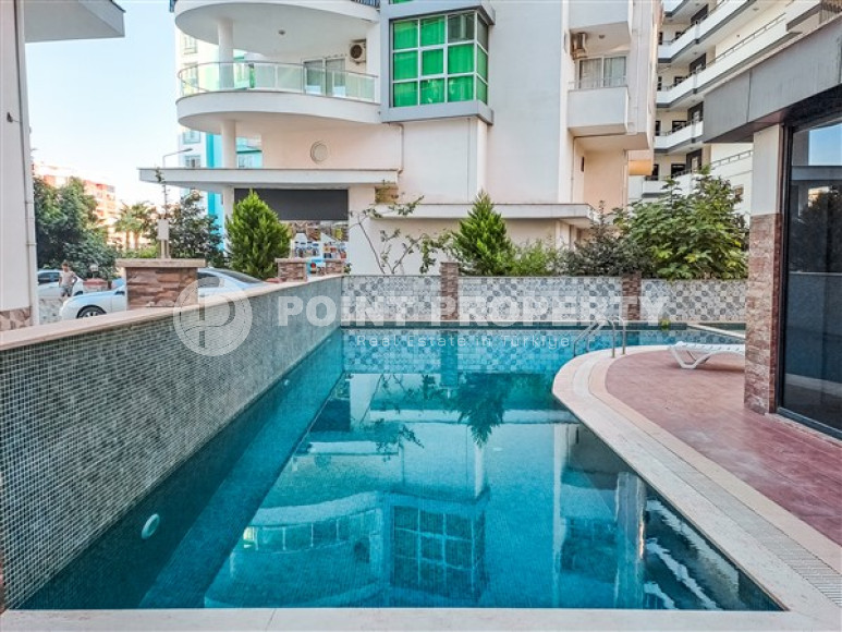 Furnished one-bedroom apartment, 70m², on the main street of Mahmutlar, Alanya-id-2624-photo-24