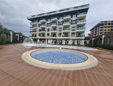 Two-room apartment, 45 m², with furniture package. in a new residence with infrastructure in Oba, Alanya-id-2630-photo-1