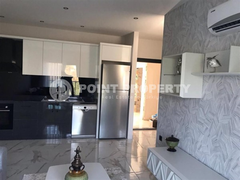 Двухкомнатная квартира, 45м², с пакетом мебели. в новой резиденции с инфраструктурой в Оба, Алания-id-2630-фото-4