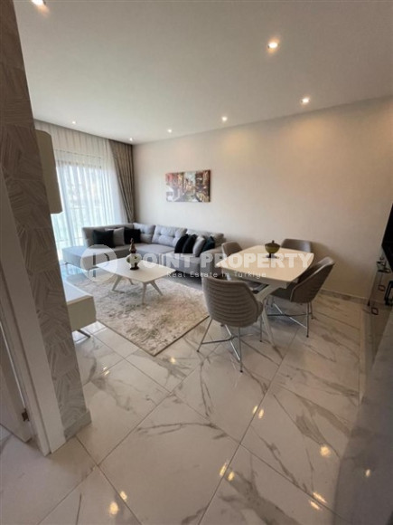 Двухкомнатная квартира, 45м², с пакетом мебели. в новой резиденции с инфраструктурой в Оба, Алания-id-2630-фото-5