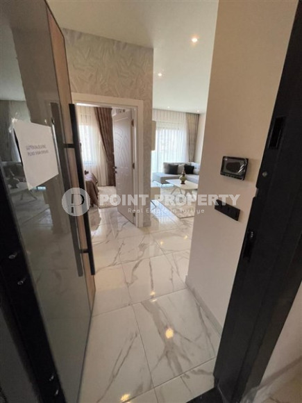 Двухкомнатная квартира, 45м², с пакетом мебели. в новой резиденции с инфраструктурой в Оба, Алания-id-2630-фото-6