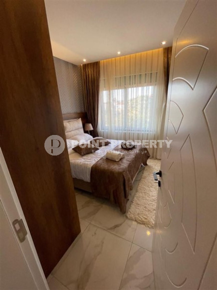 Двухкомнатная квартира, 45м², с пакетом мебели. в новой резиденции с инфраструктурой в Оба, Алания-id-2630-фото-7