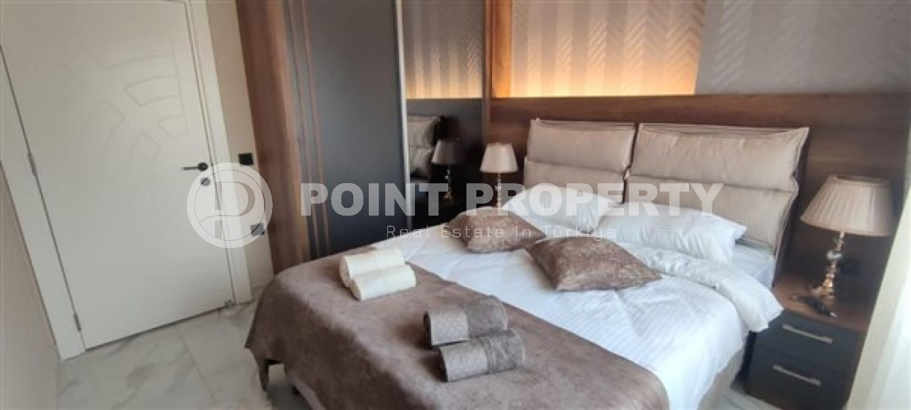 Двухкомнатная квартира, 45м², с пакетом мебели. в новой резиденции с инфраструктурой в Оба, Алания-id-2630-фото-9