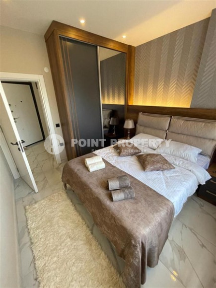 Двухкомнатная квартира, 45м², с пакетом мебели. в новой резиденции с инфраструктурой в Оба, Алания-id-2630-фото-10