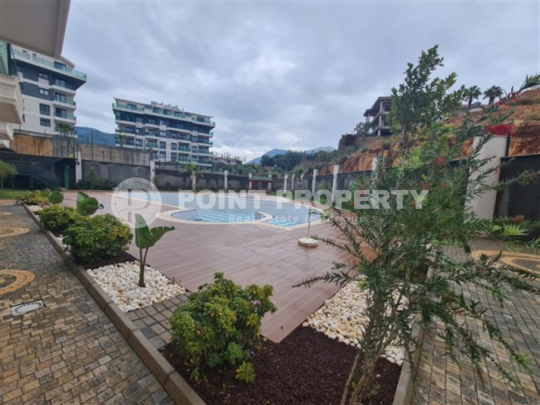 Двухкомнатная квартира, 45м², с пакетом мебели. в новой резиденции с инфраструктурой в Оба, Алания-id-2630-фото-12