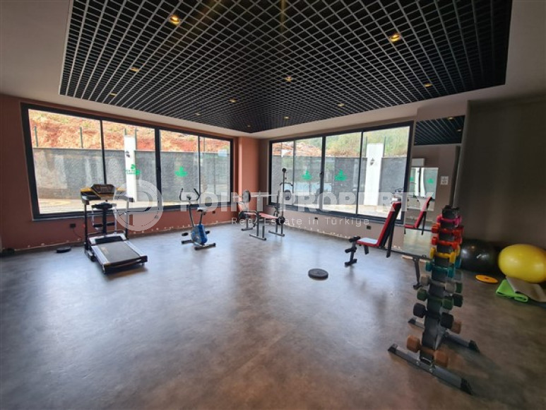 Двухкомнатная квартира, 45м², с пакетом мебели. в новой резиденции с инфраструктурой в Оба, Алания-id-2630-фото-19