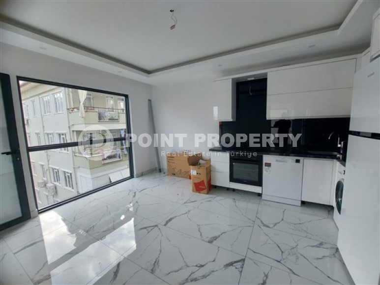 Compact 1+1 apartments, in a newly built complex, in the center of Alanya, with kitchen appliances-id-2646-photo-3
