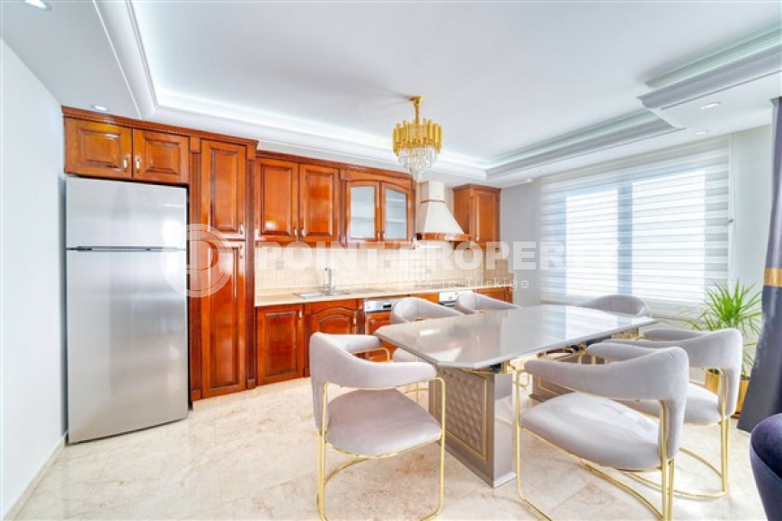 View apartment 2+1 with designer interior and extensive infrastructure in the Mahmutlar area-id-2654-photo-6
