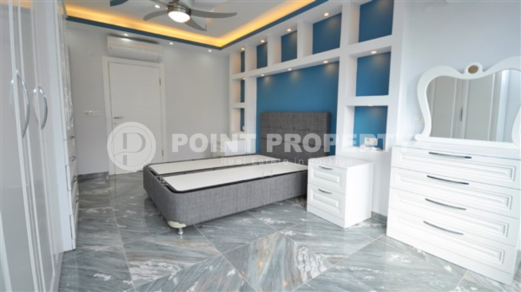 Меблированная вилла с тремя спальнями, 180м², в 50м от частного пляжа, в районе Алании Паяллар.-id-2659-фото-33