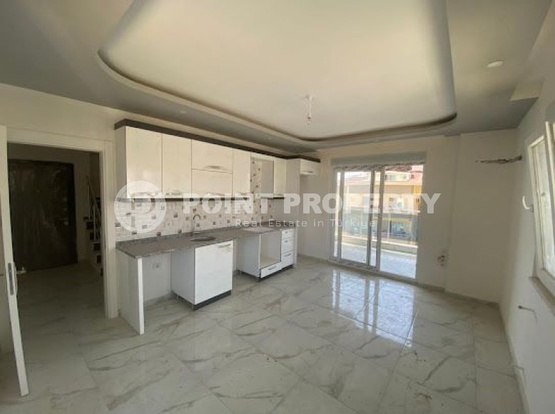 Spacious three-room penthouse on the 6th floor, unfurnished in the Alanya area, Avsallar, with an area of 120 m2-id-2666-photo-2