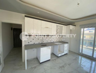 Spacious three-room penthouse on the 6th floor, unfurnished in the Alanya area, Avsallar, with an area of 120 m2-id-2666-photo-3