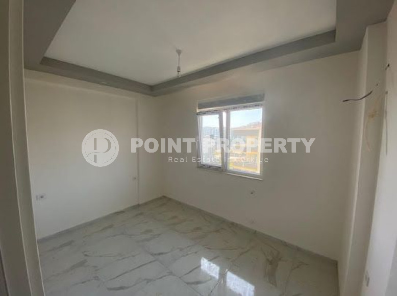 Spacious three-room penthouse on the 6th floor, unfurnished in the Alanya area, Avsallar, with an area of 120 m2-id-2666-photo-4