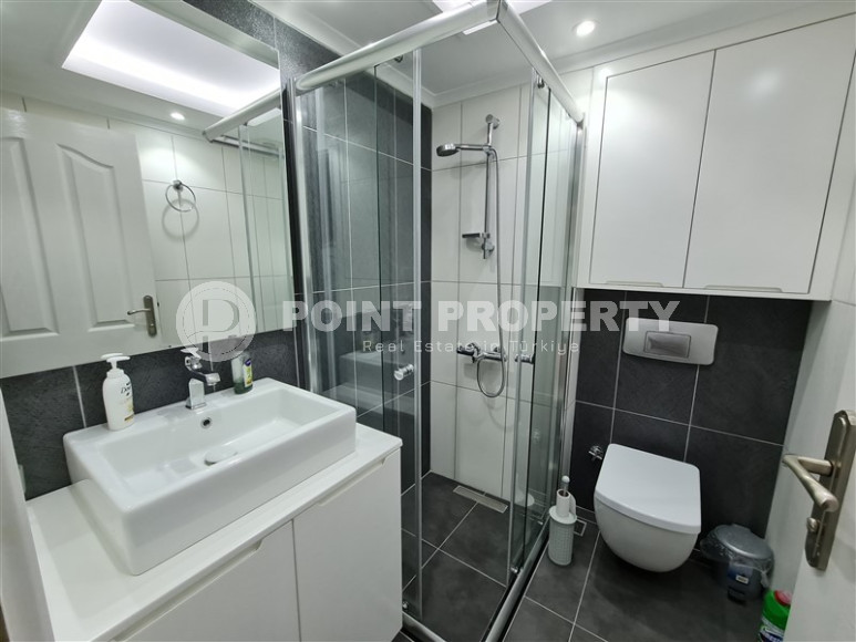 Comfortable three-room apartment from the owner with a layout of 2+1, 95 m2, in a modern complex with a swimming pool, with a full set of furniture, the center of Alanya.-id-1234-photo-6