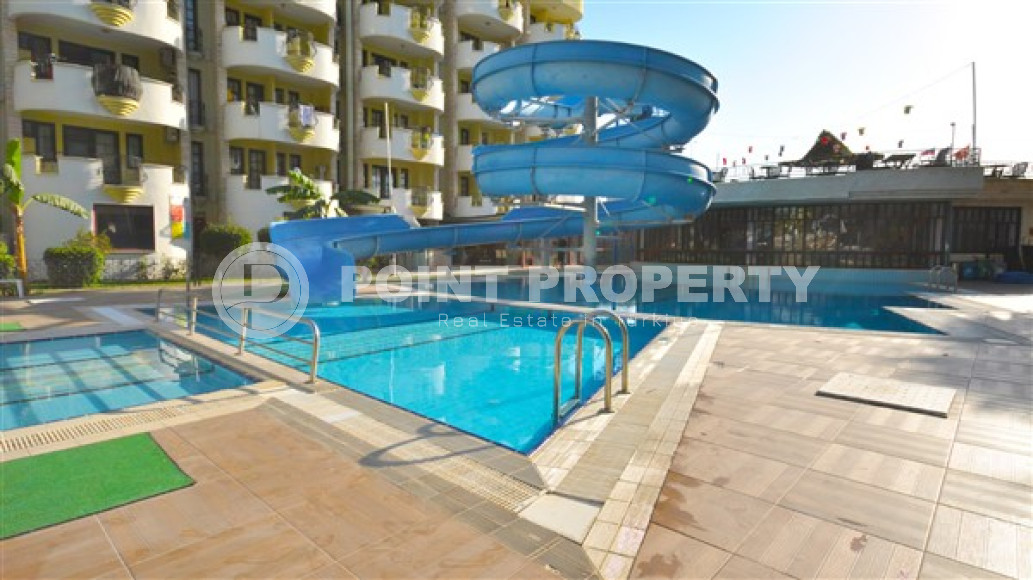 Comfortable apartment, in a low-rise complex with a private beach, 50 meters from the sea, with an area of 110 m2, in the Mahmutlar area, Alanya-id-2671-photo-18