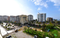 Stylish and compact 1+1 apartment with glazed balcony, 70 m2 in Mahmutlar, Alanya-id-2673-photo-1