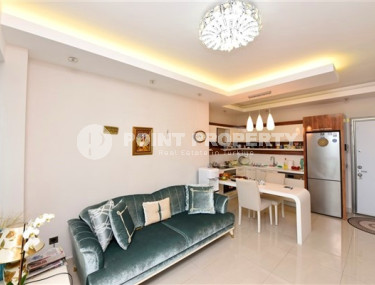 Stylish and compact 1+1 apartment with glazed balcony, 70 m2 in Mahmutlar, Alanya-id-2673-photo-2