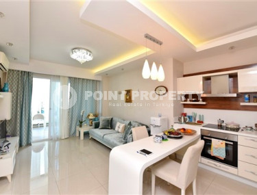 Stylish and compact 1+1 apartment with glazed balcony, 70 m2 in Mahmutlar, Alanya-id-2673-photo-3