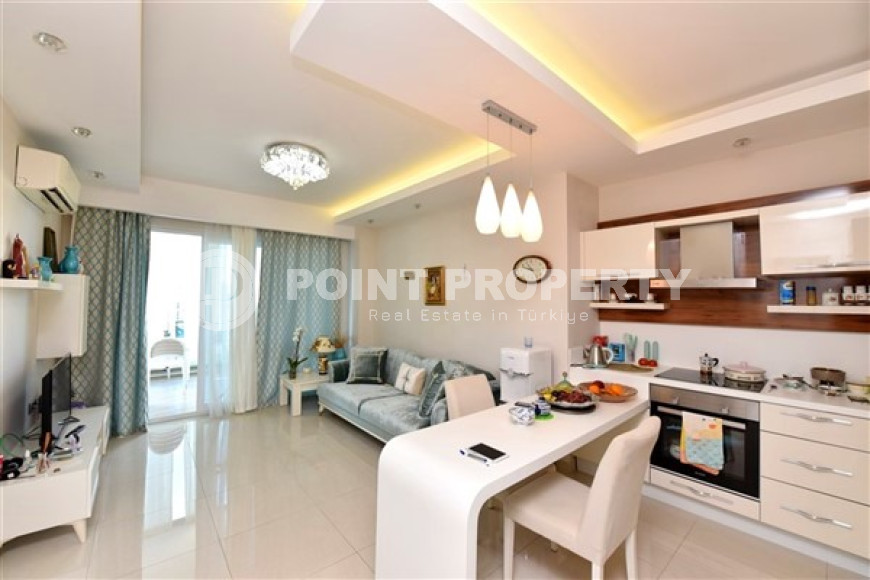 Stylish and compact 1+1 apartment with glazed balcony, 70 m2 in Mahmutlar, Alanya-id-2673-photo-3
