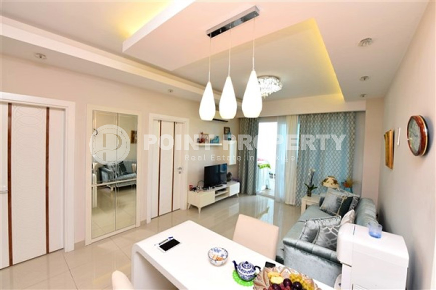 Stylish and compact 1+1 apartment with glazed balcony, 70 m2 in Mahmutlar, Alanya-id-2673-photo-5