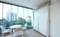 Stylish and compact 1+1 apartment with glazed balcony, 70 m2 in Mahmutlar, Alanya-id-2673-photo-10