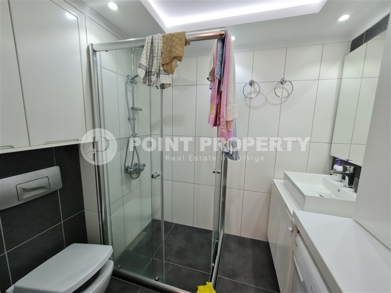 Comfortable three-room apartment from the owner with a layout of 2+1, 95 m2, in a modern complex with a swimming pool, with a full set of furniture, the center of Alanya.-id-1234-photo-13