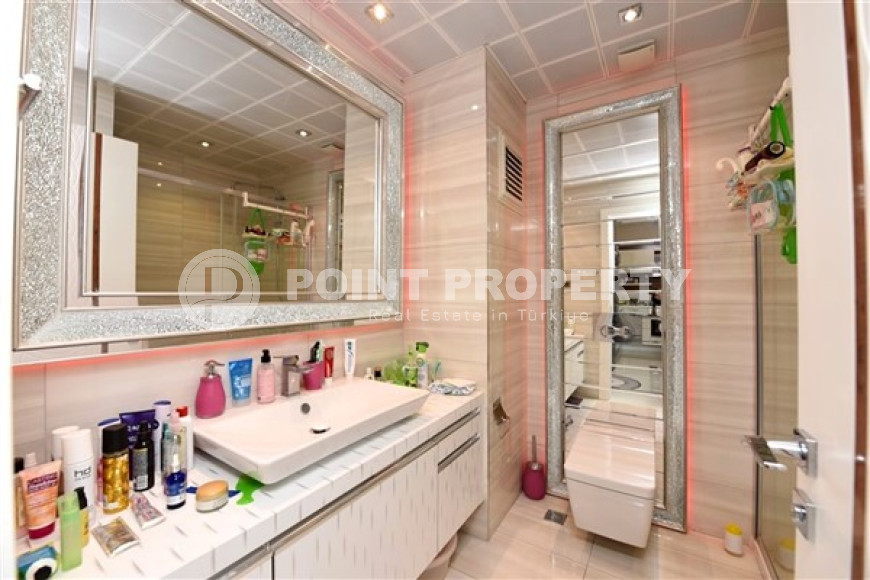 Stylish and compact 1+1 apartment with glazed balcony, 70 m2 in Mahmutlar, Alanya-id-2673-photo-15