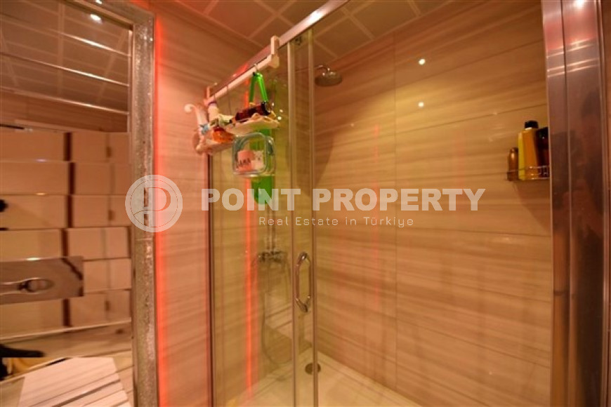 Stylish and compact 1+1 apartment with glazed balcony, 70 m2 in Mahmutlar, Alanya-id-2673-photo-19