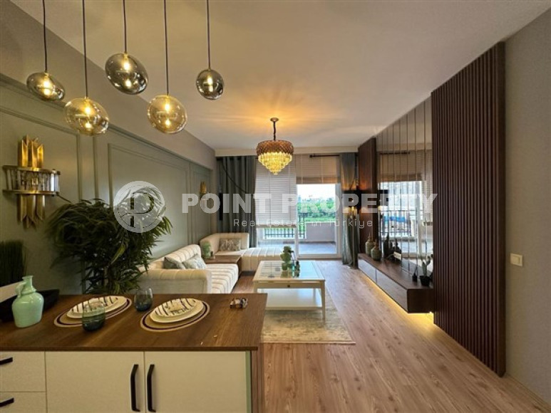 Недорогая квартира 1+1, с дизайнерским интерьером в 200 метрах от моря в районе Чешмели, Мерсин-id-2674-фото-2