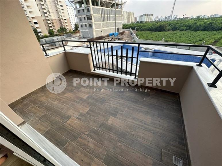 Недорогая квартира 1+1, с дизайнерским интерьером в 200 метрах от моря в районе Чешмели, Мерсин-id-2674-фото-13